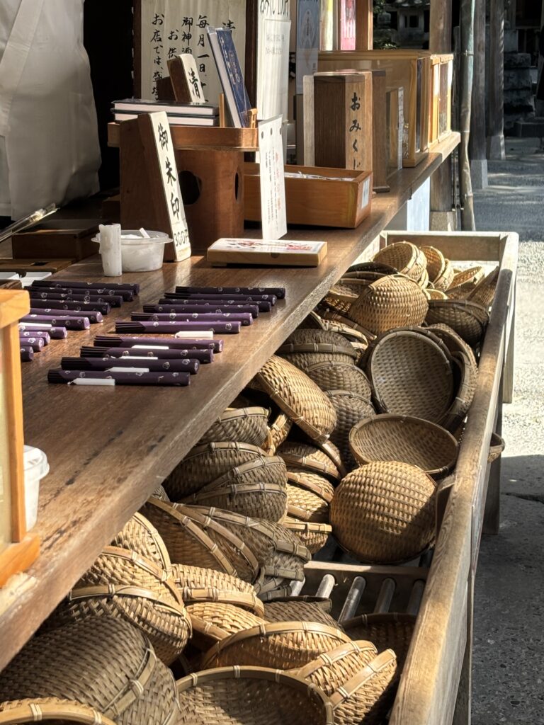 Incense, candle, and bamboo basket used for the money-washing ritual