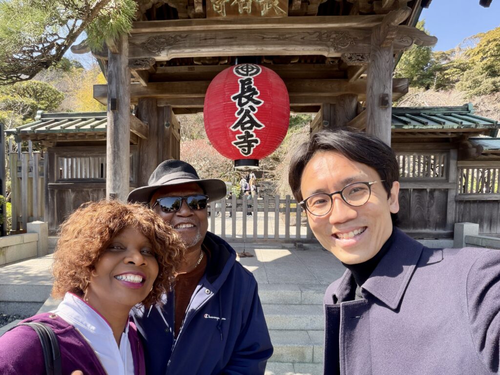 Guests visiting Hasedera Temple with a local guide during a private Kamakura tour